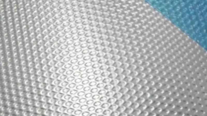 Stucco embossed aluminum sheets for roofing and insulation
