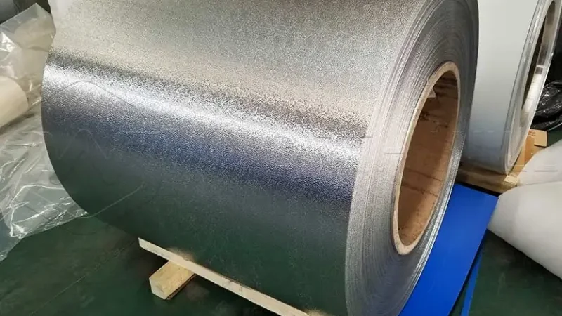 Embossed aluminum coil with stucco pattern