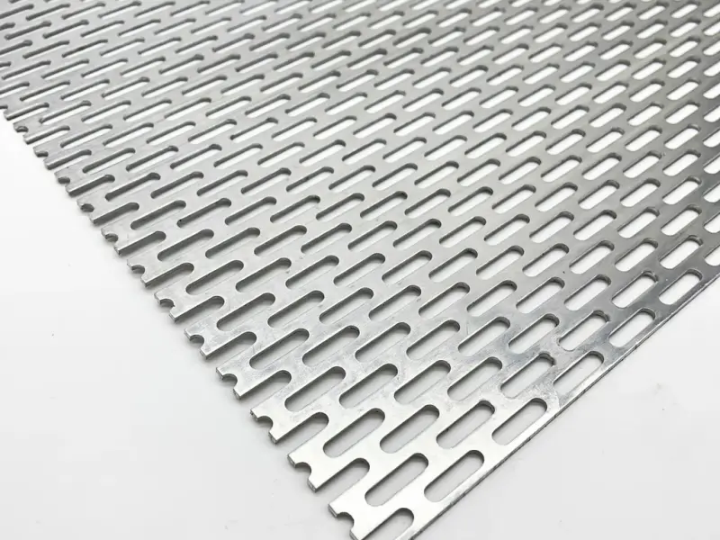 Perforated aluminum sheet metal pattern close up